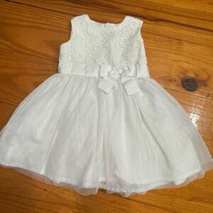 Carter’s 12 months white lace lined sleeveless back bow & zip petticoat dress